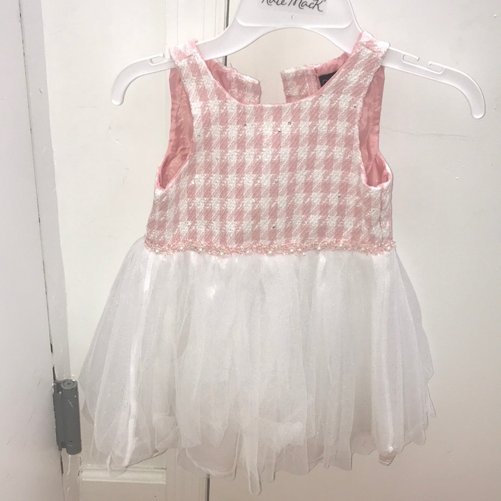 A dress comes with a jacket. Short sleeve.